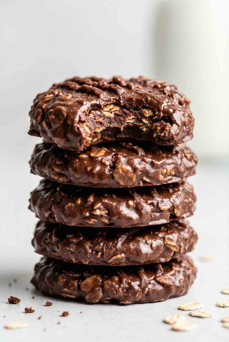 Extreme close-up stack of Chocolate No-Bake Cookies (Old Fashioned) with fudgy texture and visible oats